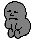 frowning gray creature